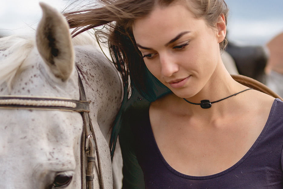 woman with horse after facial at kalos medical spa at kirby plastic surgery