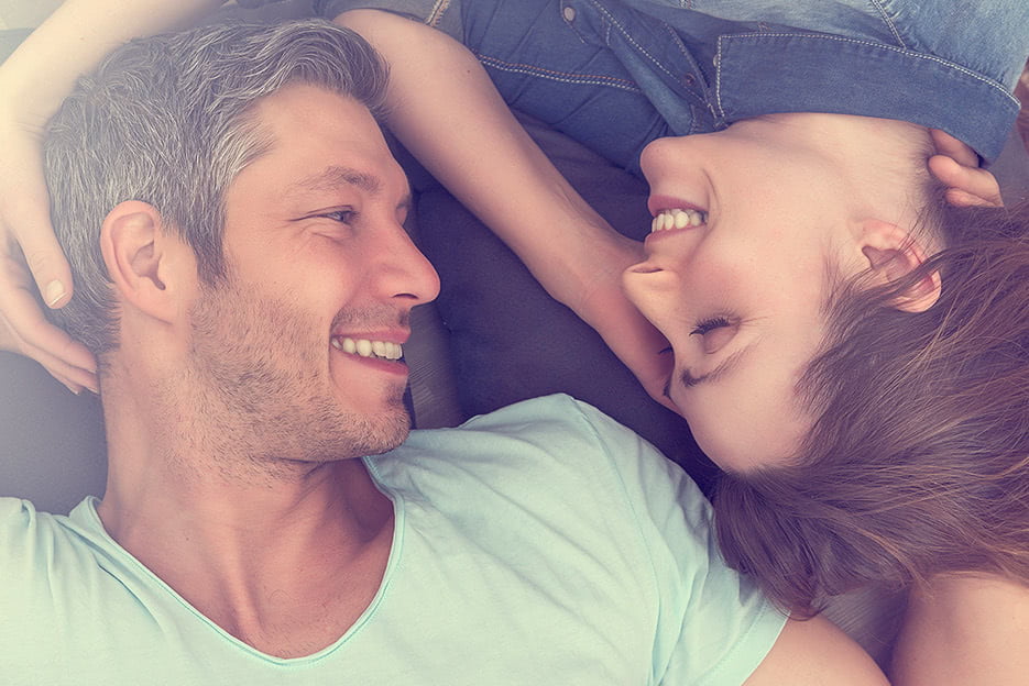 man and woman smiling at each other after medical grade skincare purchase at Kalos Medical Spa at Kirby Plastic Surgery in Forth Worth, TX