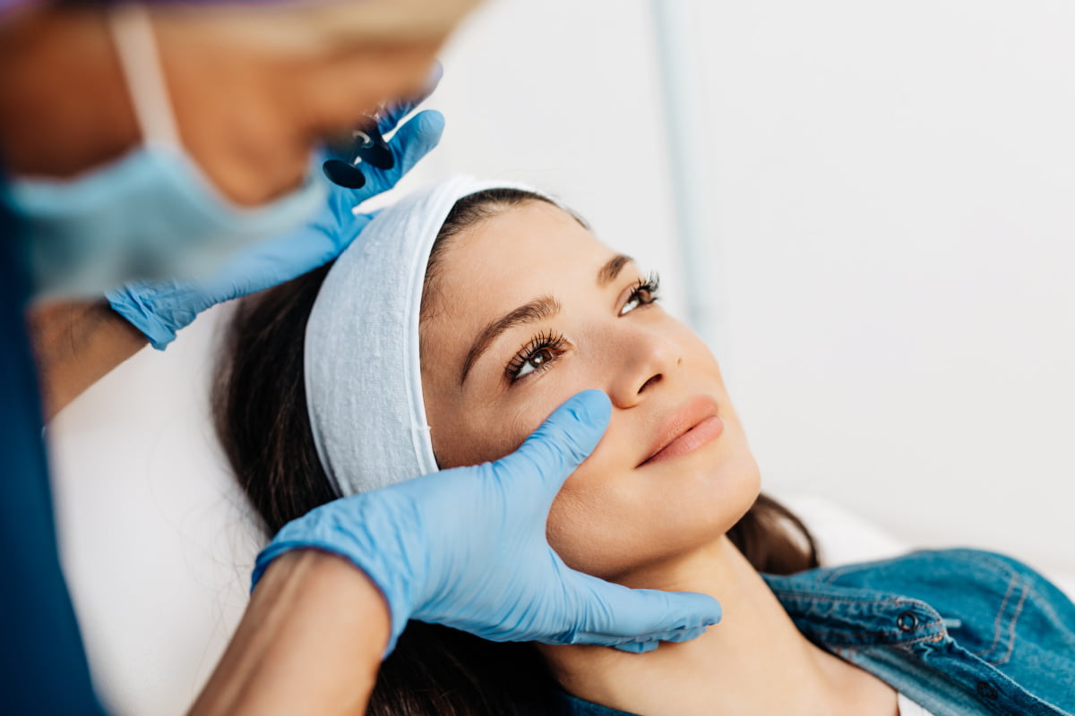 Young woman getting an injectable procedure from a provider at a medical spa