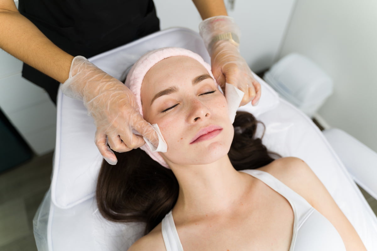 Woman getting a custom skin treatment for her skin concerns at a Fort Worth medical spa