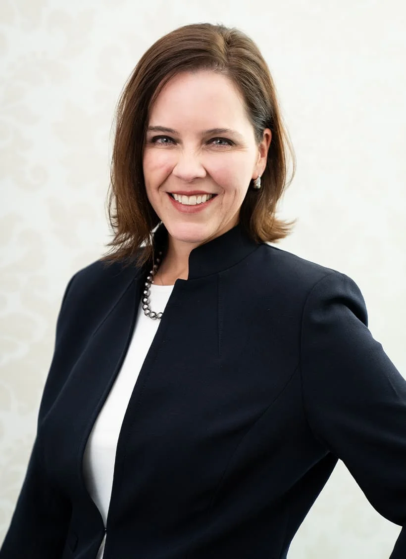 Portrait of Board Certified Plastic Surgeon Emily J. Kirby, MD smiling